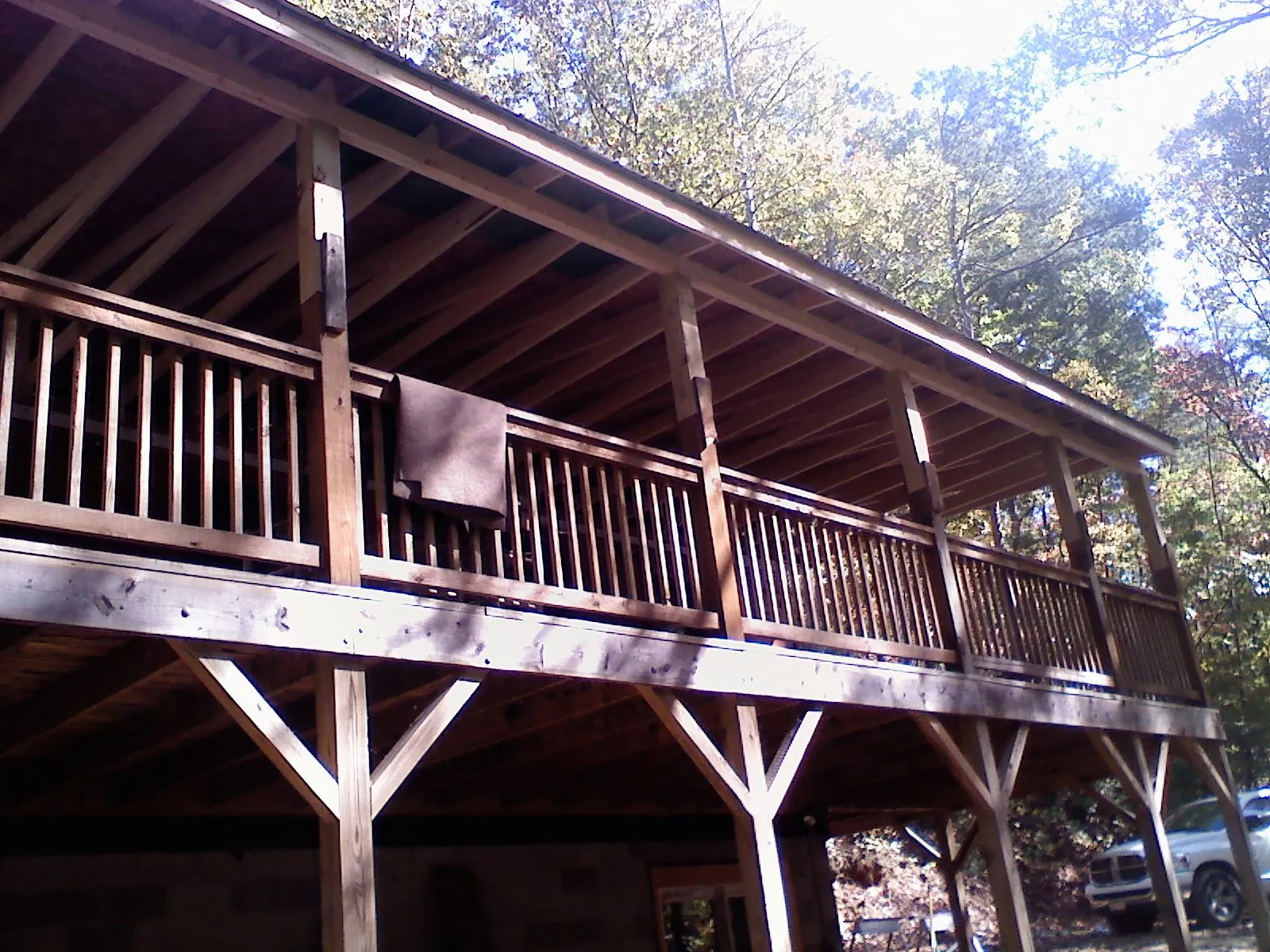 Timber framing under a new elevated porch and deck — Roof Leak Repair in Nordland by Roofing Brothers